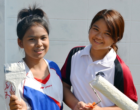 It’s a very hot day but the students are working very hard.